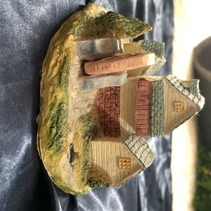 House on the prairie, antique-like decoration. Comforting trinket, neutral color